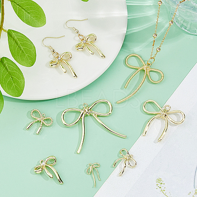 42Pcs 7 Styles Bowknot Alloy Pendants FIND-DC0007-72B-1
